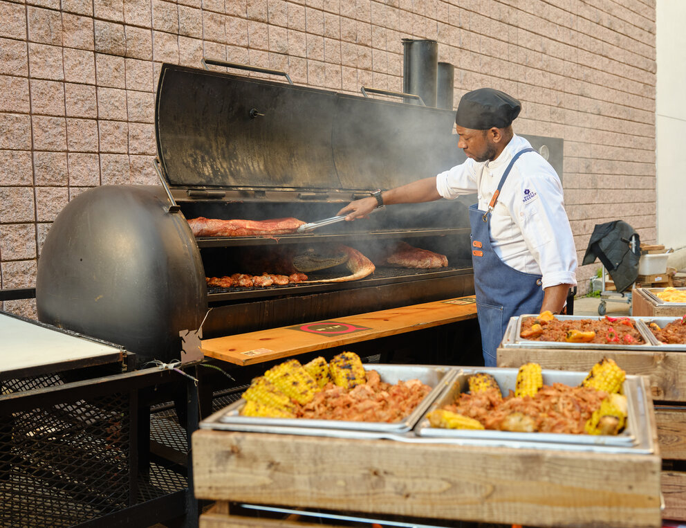 A man grilling meat