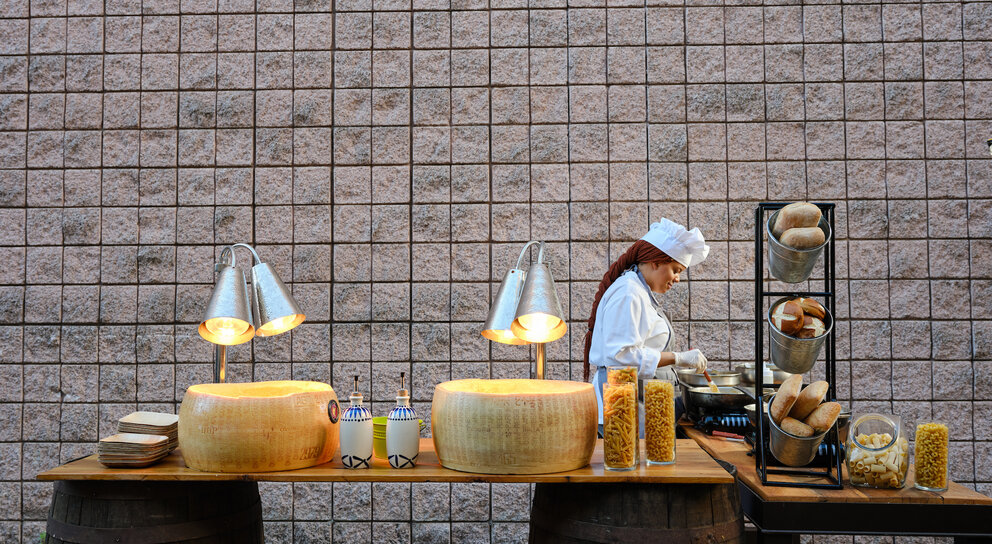 A woman cooking pasta